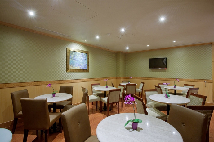 Imagen del bar/restaurante del Hotel Hope City Fushing. Foto 2