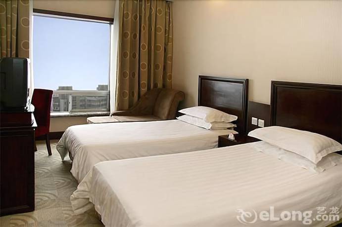 Imagen de la habitación del Hotel Hope Hotel - Shanghai. Foto 6