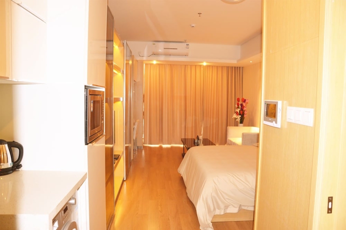 Imagen de la habitación del Hotel Hopson Ya Ju Apartment Guangzhou Hopson Plaza Branch. Foto 12