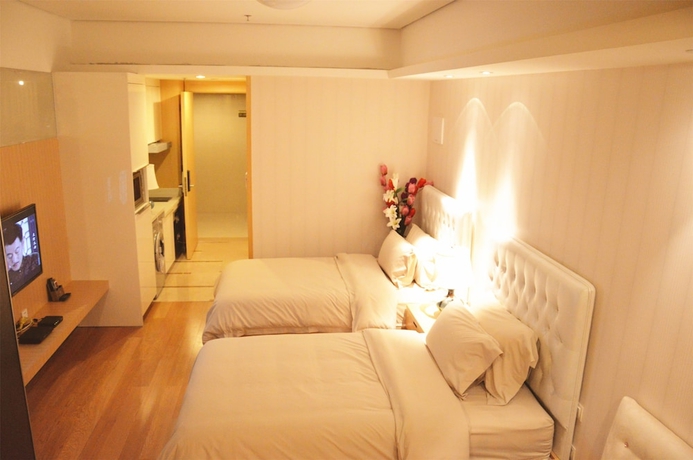 Imagen de la habitación del Hotel Hopson Ya Ju Apartment Guangzhou Hopson Plaza Branch. Foto 16