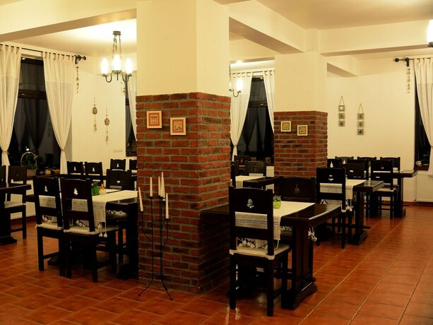 Imagen del bar/restaurante del Hotel Hora Cu Brazi. Foto 3