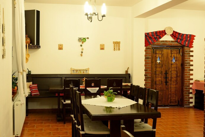 Imagen del bar/restaurante del Hotel Hora Cu Brazi. Foto 5