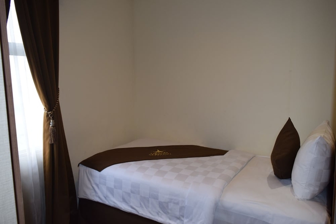 Imagen de la habitación del Hotel Horison Grand Serpong. Foto 8