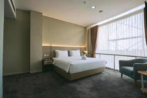 Imagen de la habitación del Hotel Horison TC UPI Serang. Foto 20