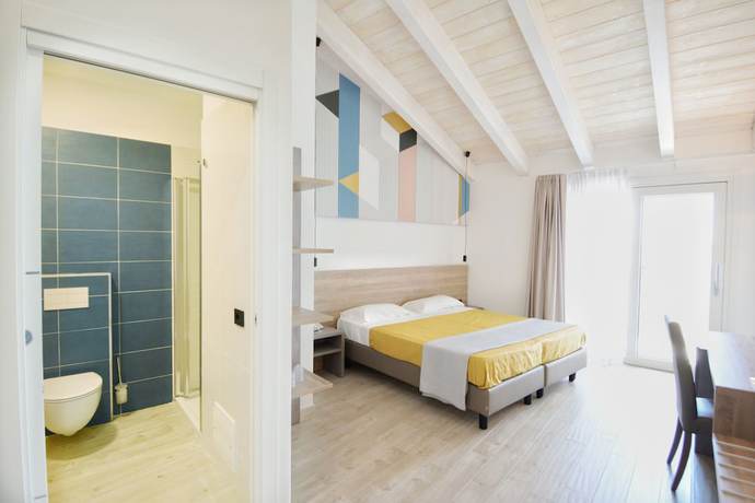 Imagen de la habitación del Hotel Horizon Badesi. Foto 3