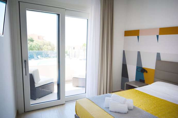 Imagen de la habitación del Hotel Horizon Badesi. Foto 7