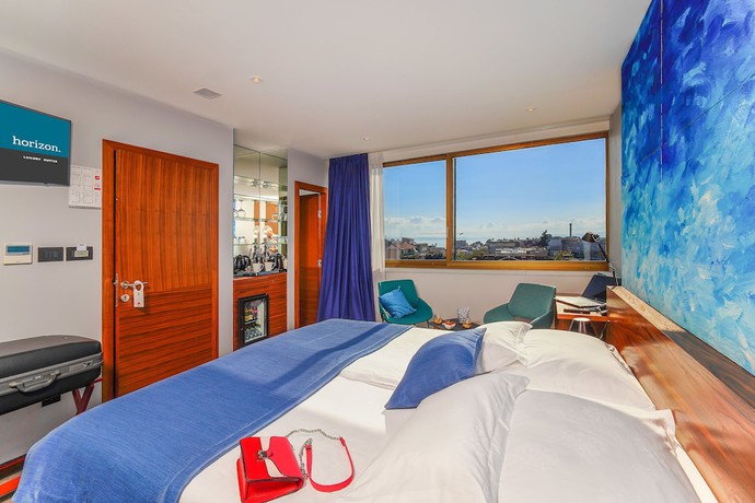 Imagen de la habitación del Hotel Horizon Luxury Suites. Foto 15