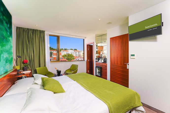 Imagen de la habitación del Hotel Horizon Luxury Suites. Foto 16