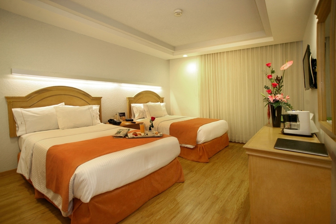 Imagen de la habitación del Hotel Horizon and Convention Center. Foto 8