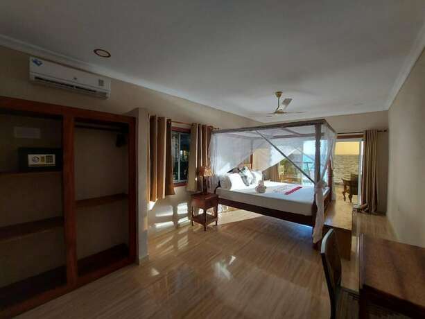Imagen de la habitación del Hotel Horizon of Michamvi Beach. Foto 15
