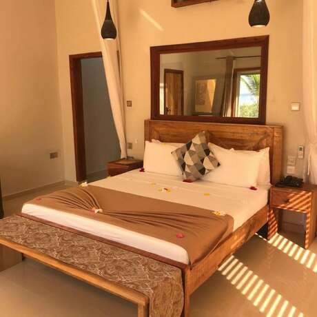Imagen de la habitación del Hotel Horizon of Michamvi Beach. Foto 19