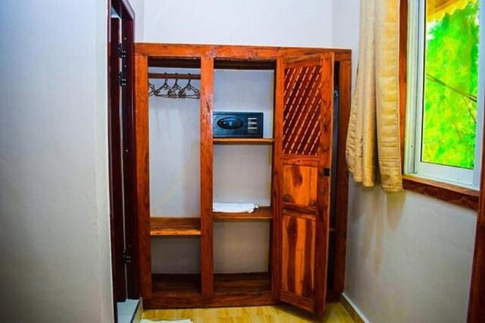 Imagen de la habitación del Hotel Horizon of Michamvi Beach. Foto 20