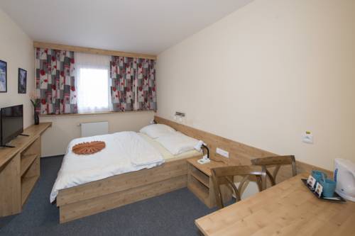 Imagen de la habitación del Hotel Horsk&yacute; Skiland. Foto 13