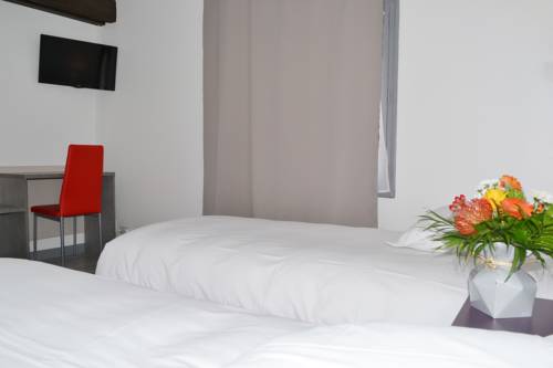 Imagen de la habitación del Hotel Hortencia Hôtel Du Cheval Blanc. Foto 9