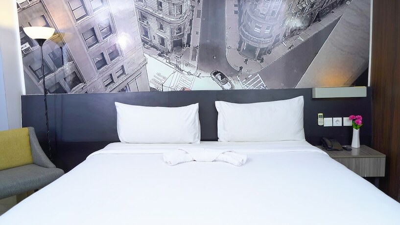 Imagen de la habitación del Hotel Horu Mangga Dua Square. Foto 6