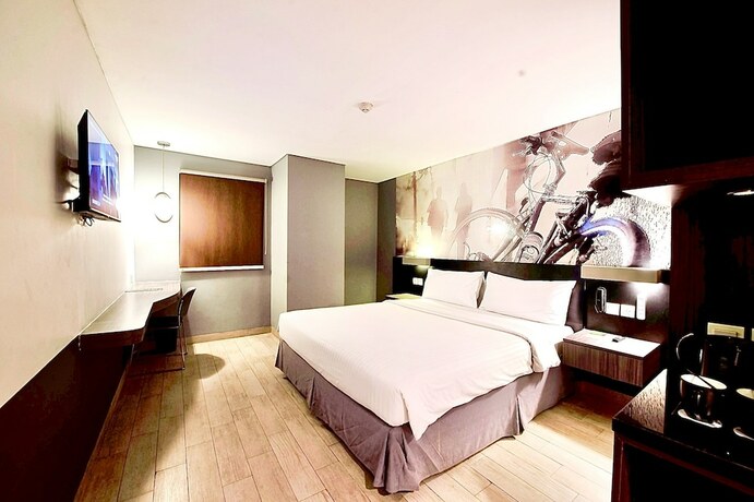 Imagen de la habitación del Hotel Horu Mangga Dua Square. Foto 7