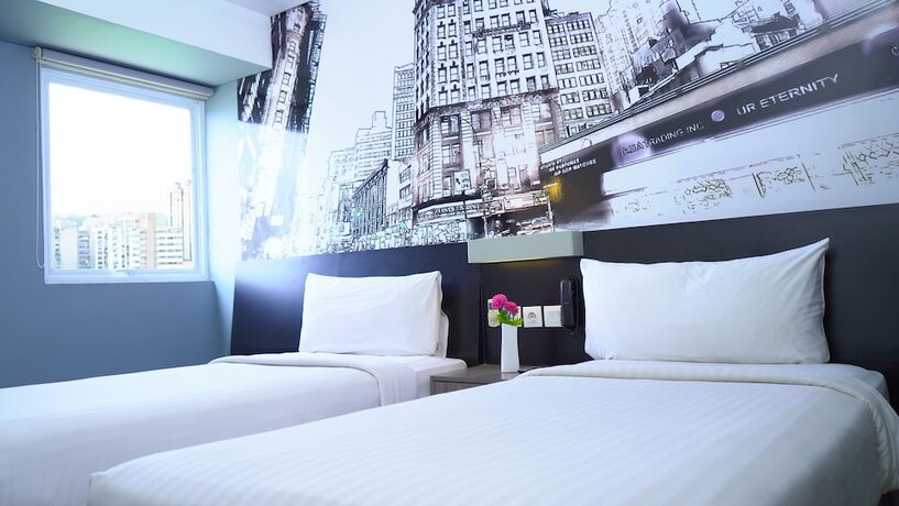 Imagen de la habitación del Hotel Horu Mangga Dua Square. Foto 9