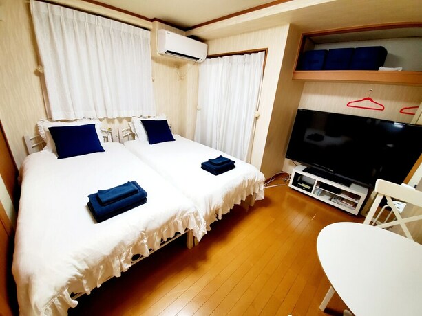 Imagen de la habitación del Hotel Hosei Apartment 101. Foto 28