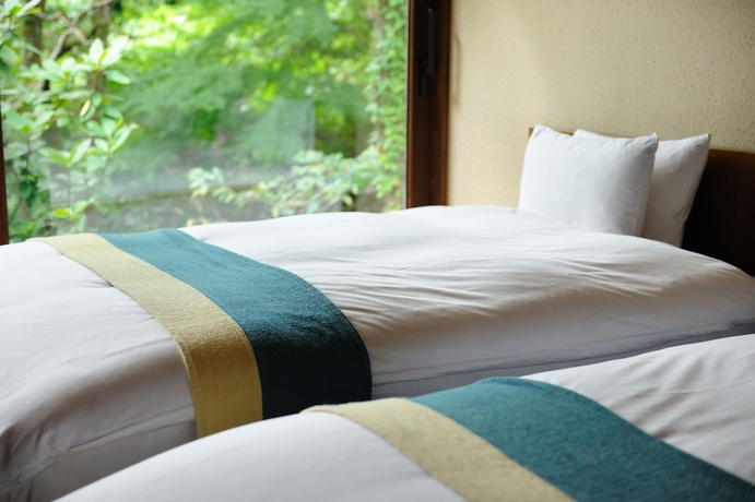 Imagen de la habitación del Hotel Hoshino Resorts Kai Aso. Foto 8