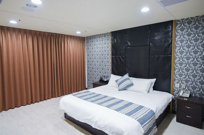 Imagen de la habitación del Hotel Hosin. Foto 19