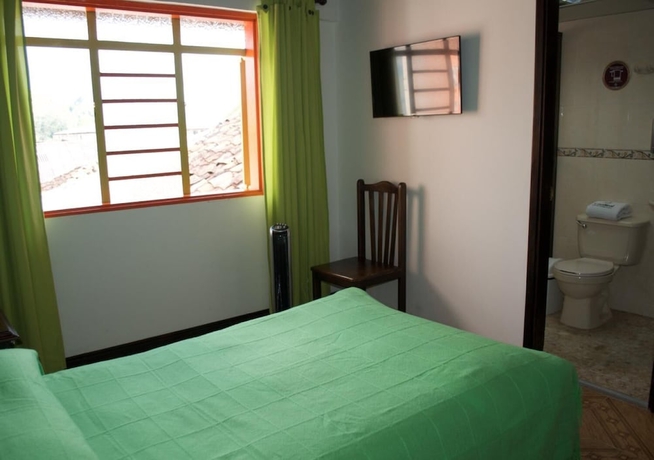 Imagen de la habitación del Hotel Hospedaje Casa Real. Foto 11