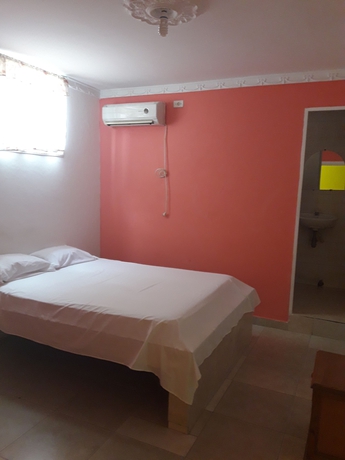 Imagen de la habitación del Hotel Hospedaje Casa Rosada. Foto 3