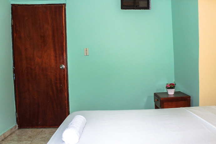 Imagen de la habitación del Hotel Hospedaje Casa Rosada. Foto 6