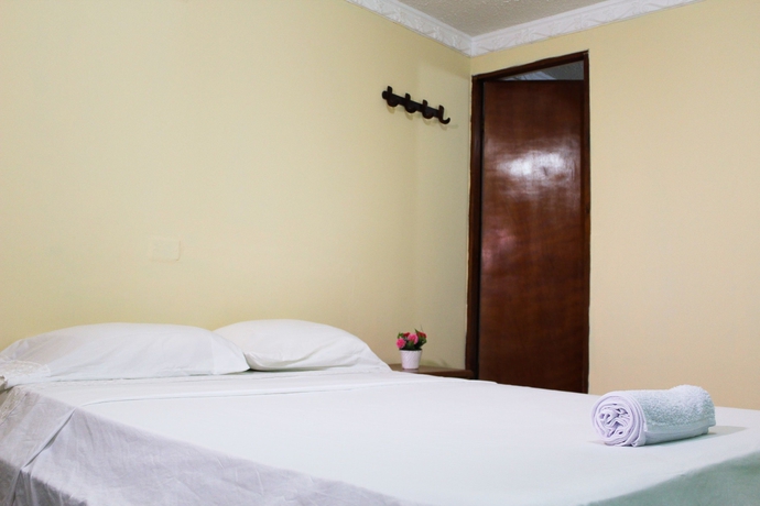 Imagen de la habitación del Hotel Hospedaje Casa Rosada. Foto 7