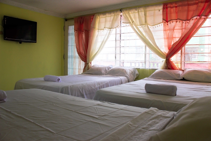 Imagen de la habitación del Hotel Hospedaje Casa Rosada. Foto 9