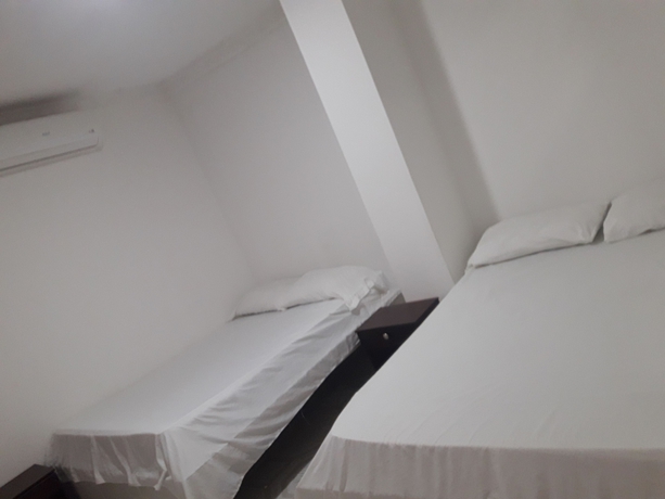 Imagen de la habitación del Hotel Hospedaje Casa Rosada. Foto 12