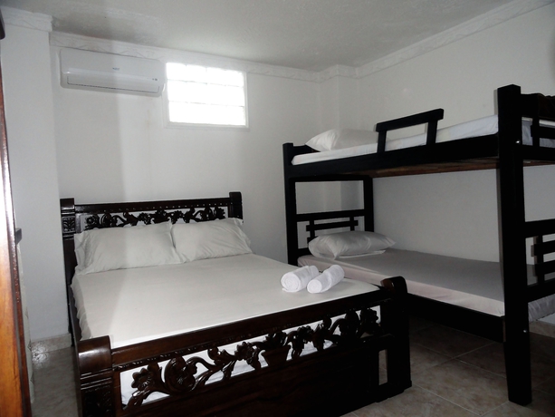 Imagen de la habitación del Hotel Hospedaje Casa Rosada. Foto 13