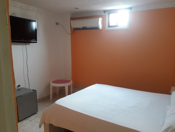 Imagen de la habitación del Hotel Hospedaje Casa Rosada. Foto 14