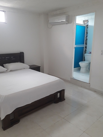 Imagen de la habitación del Hotel Hospedaje Casa Rosada. Foto 15