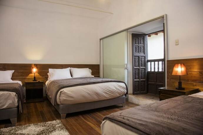 Imagen de la habitación del Hotel Hospedaje Casa de Fierro - Adults Only. Foto 17