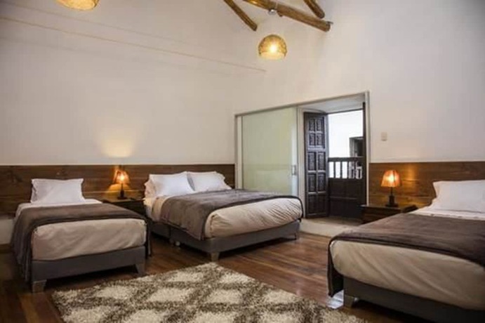 Imagen de la habitación del Hotel Hospedaje Casa de Fierro - Adults Only. Foto 19