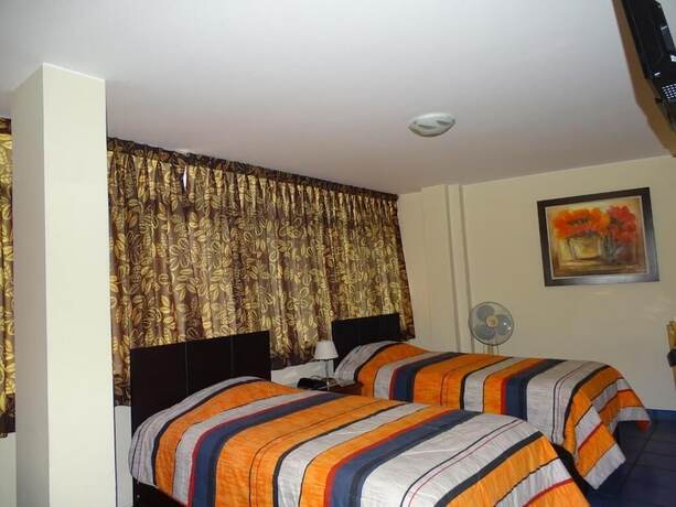 Imagen de la habitación del Hotel Hospedaje Dimar Inn. Foto 18