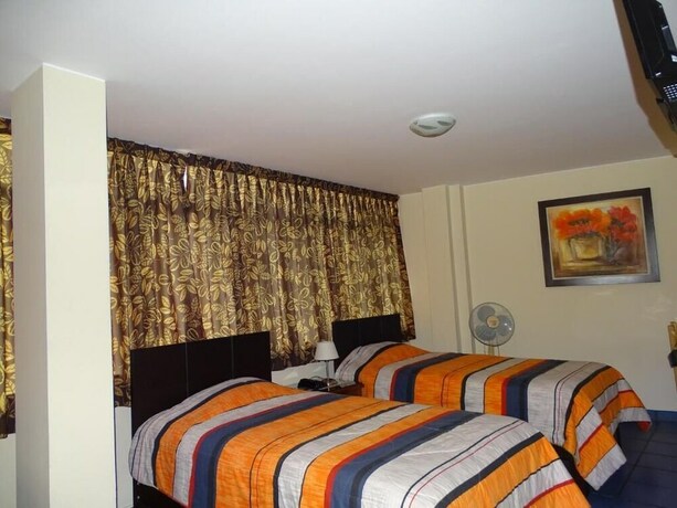 Imagen de la habitación del Hotel Hospedaje Dimar Inn. Foto 32