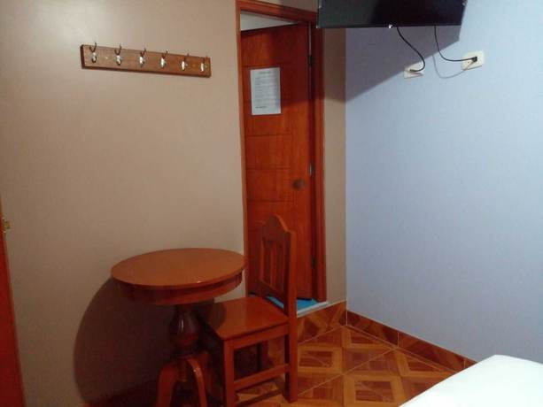 Imagen de la habitación del Hotel Hospedaje Feliz. Foto 7