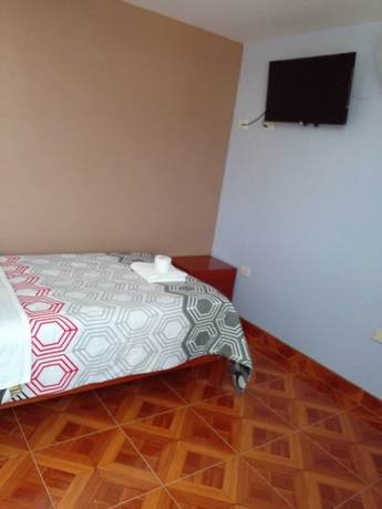 Imagen de la habitación del Hotel Hospedaje Feliz. Foto 10