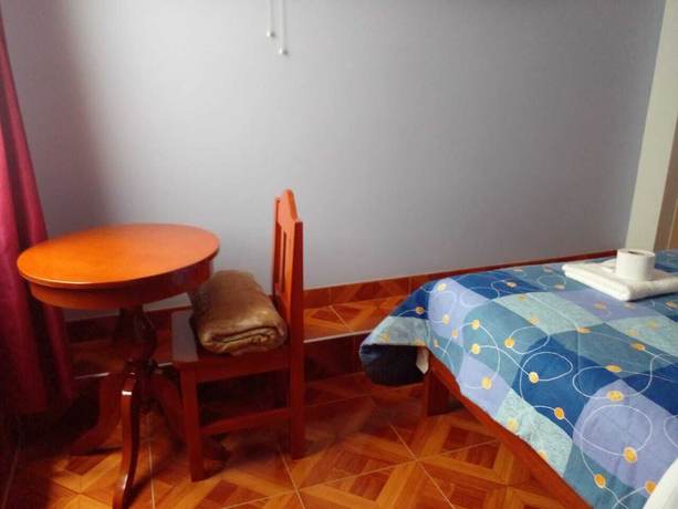 Imagen de la habitación del Hotel Hospedaje Feliz. Foto 12