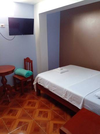 Imagen de la habitación del Hotel Hospedaje Feliz. Foto 16