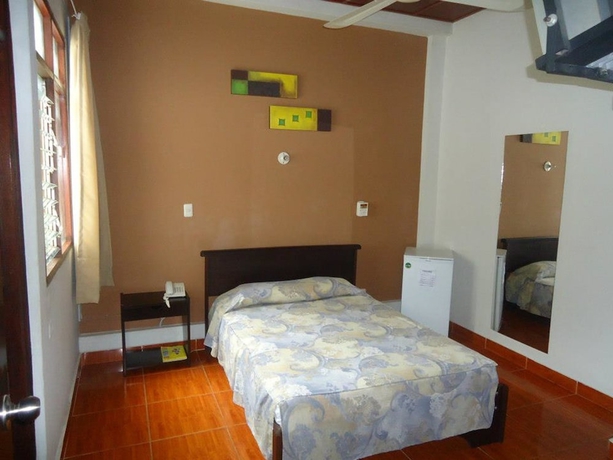 Imagen de la habitación del Hotel Hospedaje Komby. Foto 7