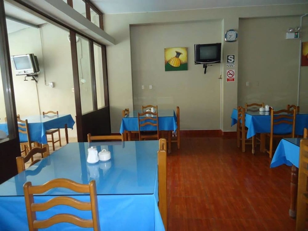 Imagen del bar/restaurante del Hotel Hospedaje Komby. Foto 2