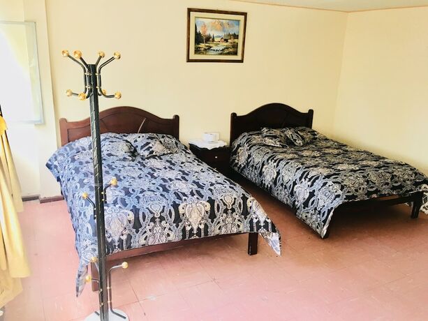 Imagen de la habitación del Hotel Hospedaje Miami. Foto 13