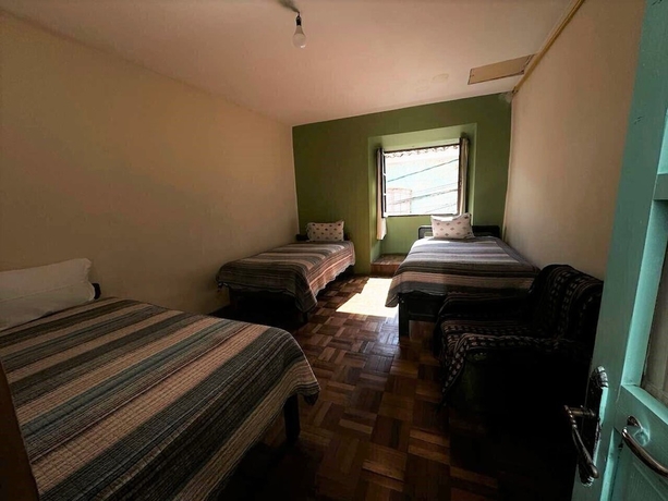 Imagen de la habitación del Hotel Hospedaje Milenio - Hostel. Foto 6