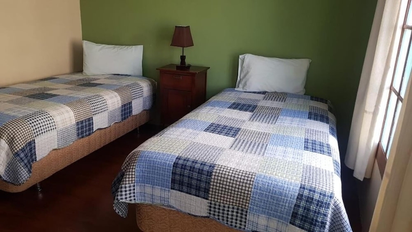 Imagen de la habitación del Hotel Hospedaje Milenio - Hostel. Foto 11