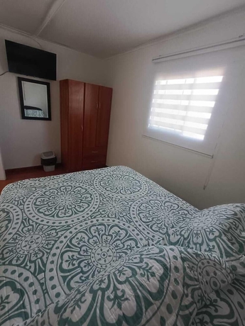 Imagen de la habitación del Hotel Hospedaje Nuevo Amanecer. Foto 7