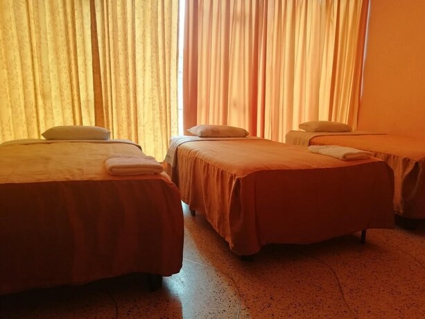 Imagen de la habitación del Hotel Hospedaje Oasis. Foto 21