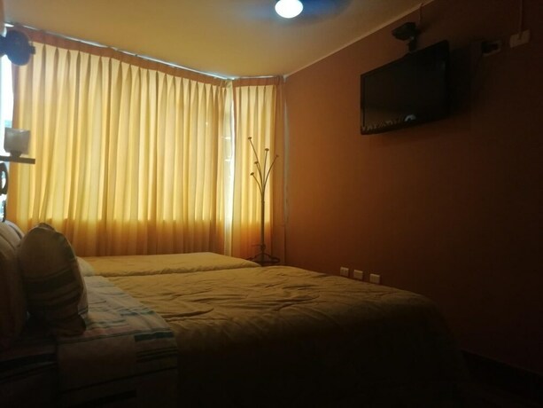 Imagen de la habitación del Hotel Hospedaje Oasis. Foto 29