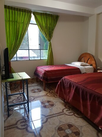 Imagen de la habitación del Hotel Hospedaje Puriq - Hostel. Foto 16